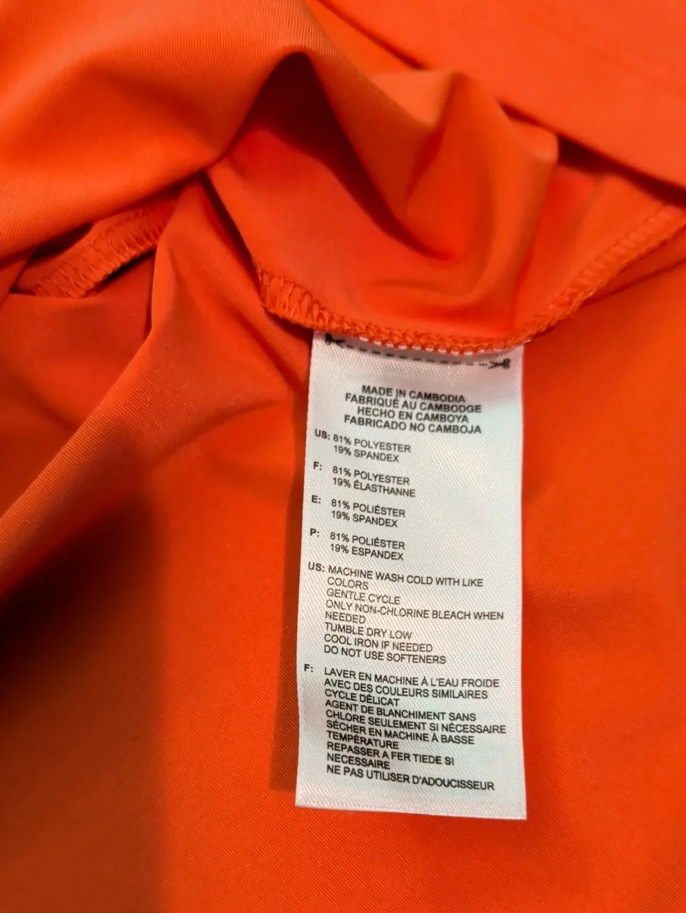 Prince Girls' Sleeveless Polo Dress in Bright Orange with White Trim